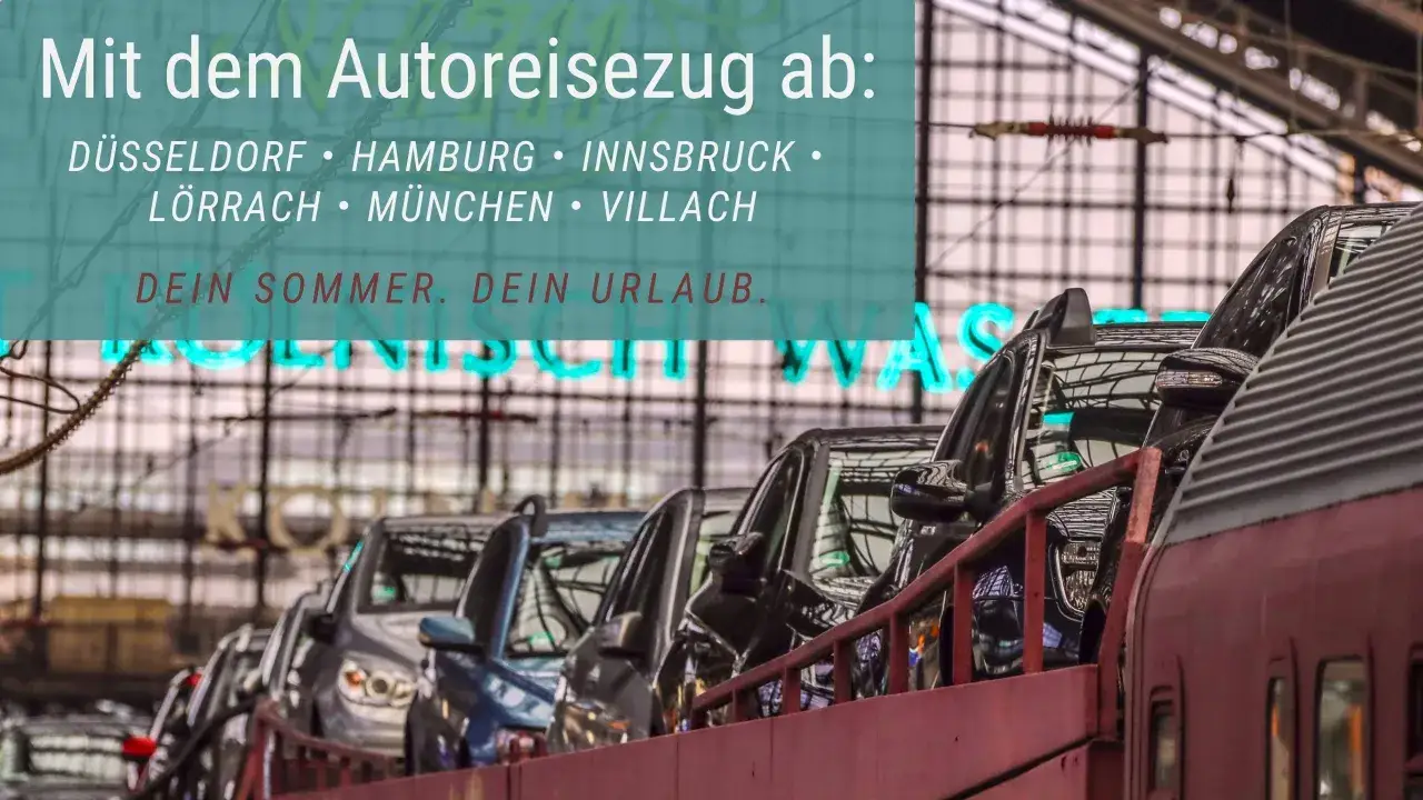 Bilar lastade på ett tåg, redo för en resa. Tänk dig att ta ditt eget fordon med på semestern, kanske till Hamburg eller Innsbruck.